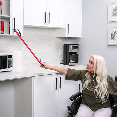 Red Pistol Grip Reaching Aid with Open Jaw